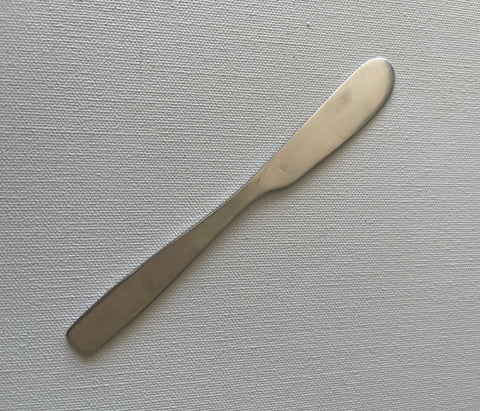 MIDCENTURY BUTTER KNIFE.