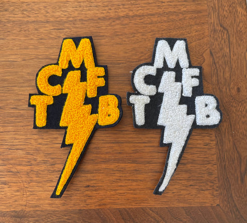 TWO 7” TCMFB CHENILLE PATCHES.