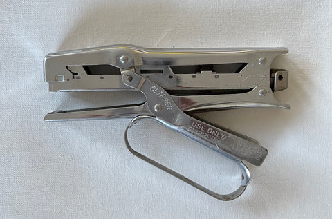 VINTAGE CLIPPER HAND HELD STAPLER.