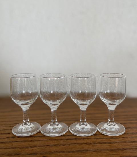  4 VERY MINIATURE WINE GLASSES.