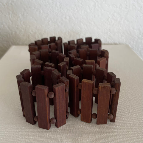 SET OF 6 MIDCENTURY TEAK NAPKIN RINGS.