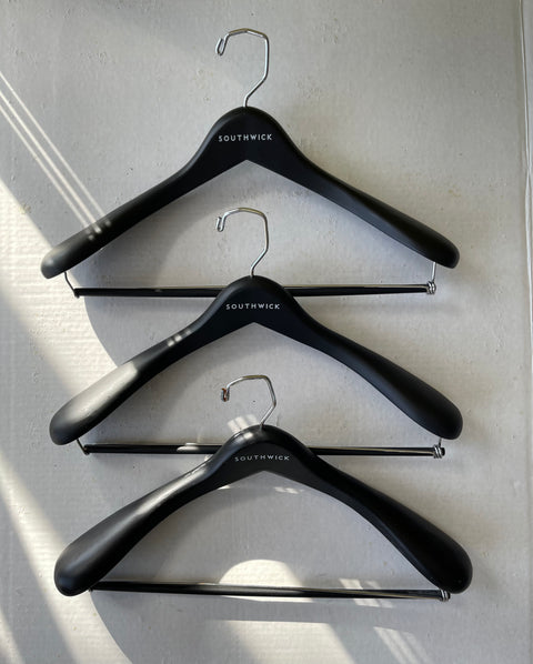 3 SOUTHWICK SUIT HANGERS.