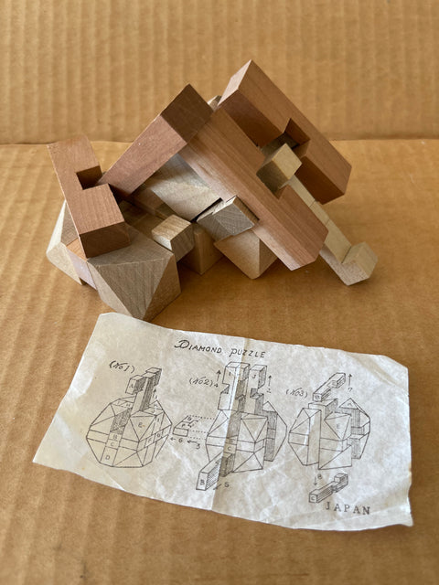 MIDCENTURY WOODEN DIAMOND PUZZLE.